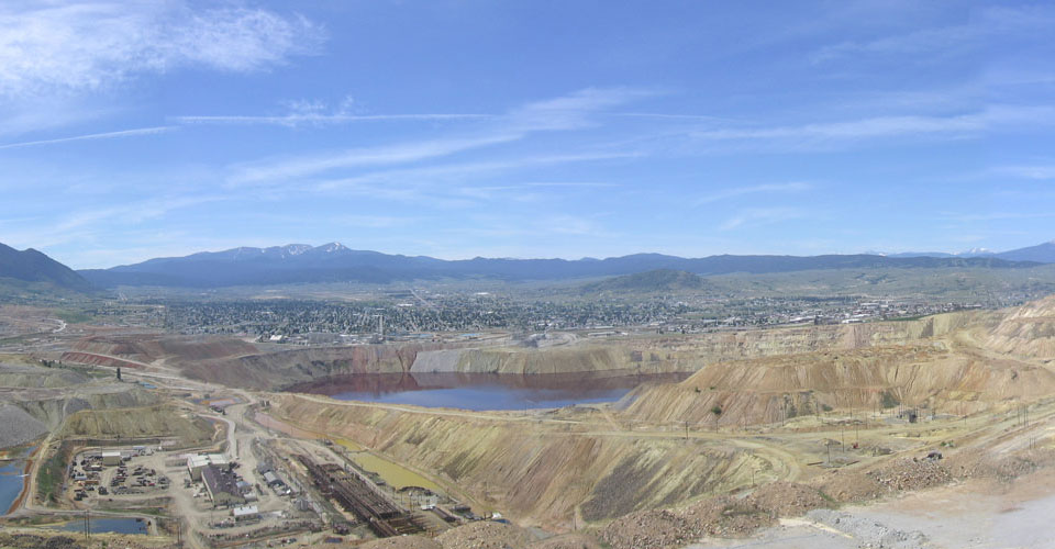 Looking south toward Butte, Montana over the Berkeley Pit, from the Yankee Doodle Tailings Pond dam. Photo by Justin Ringsak.