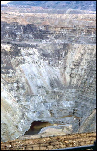 The Berkeley Pit in 1982. The water seen here is surface runoff flowing into the Leonard mine shaft to the right at the Pit bottom.